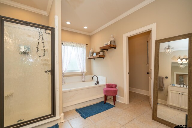 bathroom with tile patterned floors, crown molding, vanity, a notable chandelier, and plus walk in shower