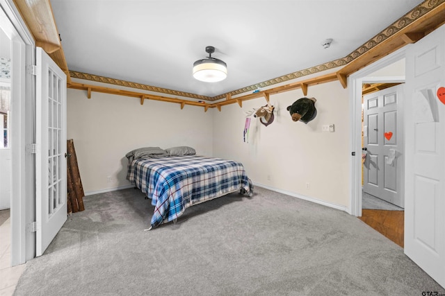 bedroom featuring carpet