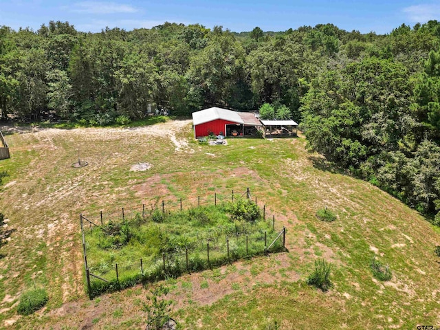 birds eye view of property featuring a rural view