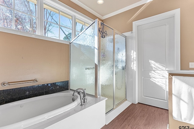 bathroom featuring hardwood / wood-style flooring, independent shower and bath, and crown molding