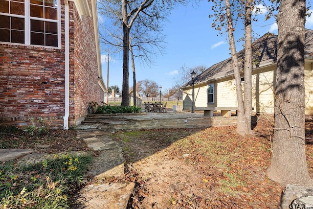 view of yard featuring a patio area