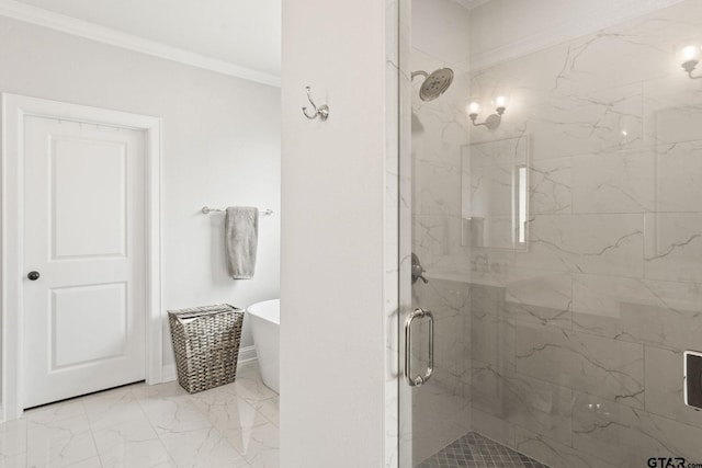 bathroom featuring ornamental molding and separate shower and tub