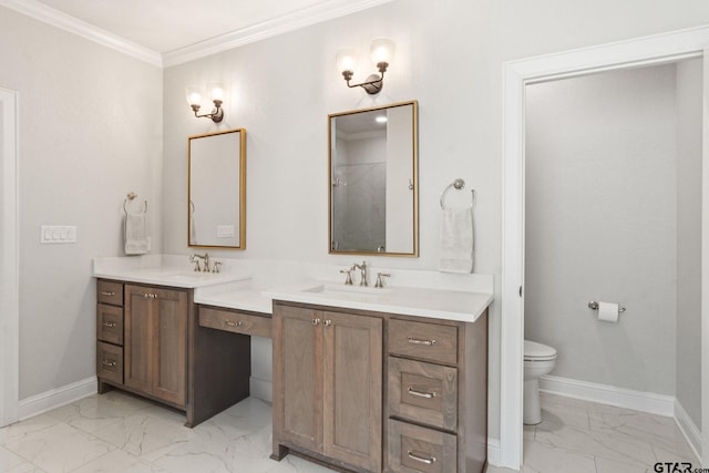 bathroom featuring vanity, toilet, and ornamental molding