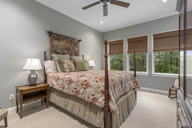 bedroom featuring crown molding, baseboards, light carpet, and recessed lighting