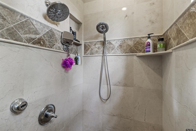 details with a tile shower