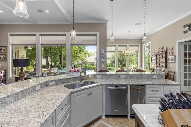 kitchen featuring light tile patterned flooring, light stone counters, a sink, dishwasher, and pendant lighting