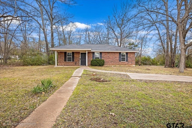 view of front of home with a front yard and covered porch