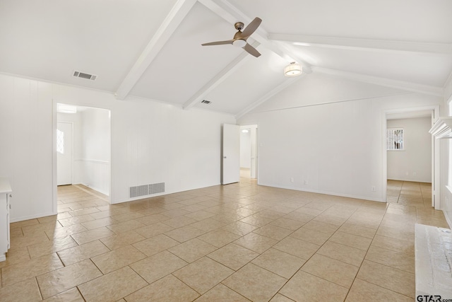 unfurnished room featuring light tile patterned floors, lofted ceiling with beams, plenty of natural light, and ceiling fan