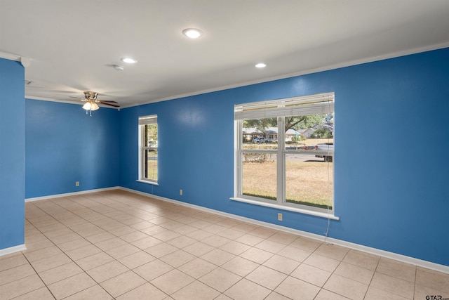 empty room with ornamental molding, baseboards, ceiling fan, recessed lighting, and light tile patterned floors