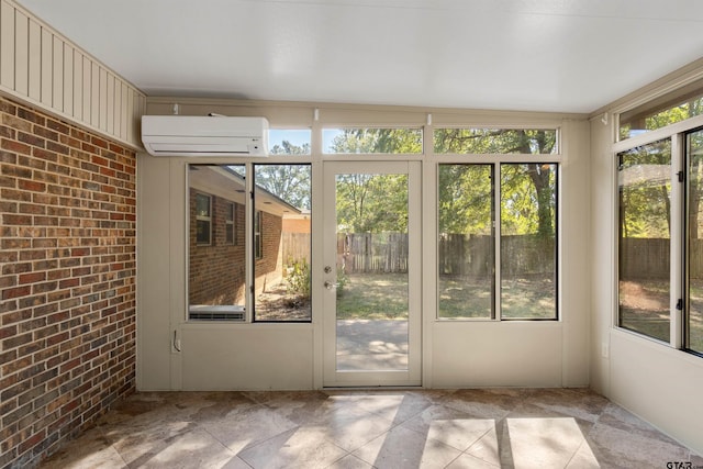 unfurnished sunroom featuring a wall mounted AC