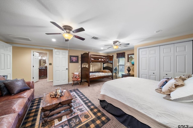 carpeted bedroom with recessed lighting, visible vents, a ceiling fan, ornamental molding, and baseboards