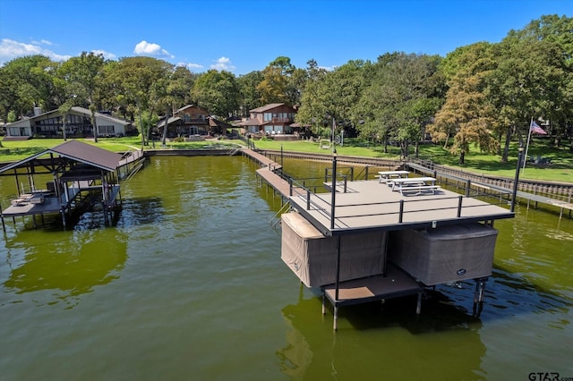 view of dock featuring a water view and boat lift
