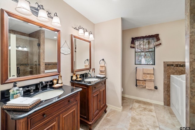 full bath with two vanities, a garden tub, a sink, and a shower stall