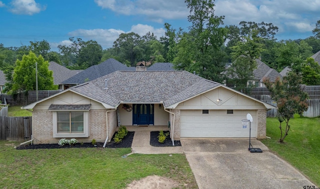 6001 Huntington Dr, Tyler, TX 75703 - view of front facade featuring a shingled roof, a garage, driveway, and brick siding