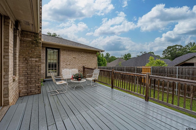 6001 Huntington Dr, Tyler, TX 75703 - wooden deck featuring a fenced backyard
