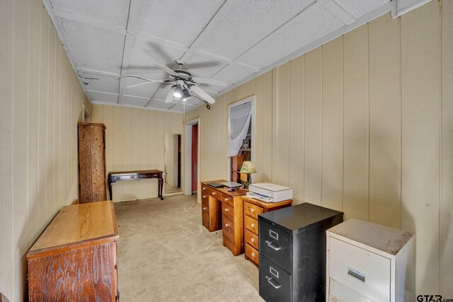 office featuring light carpet and ceiling fan