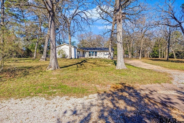 view of front of house with a front lawn