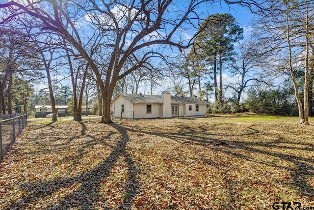 exterior space with a front yard