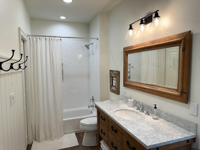 full bath featuring shower / tub combo, vanity, and toilet