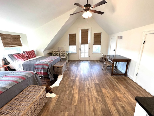 bedroom featuring lofted ceiling, wood finished floors, visible vents, a ceiling fan, and access to outside