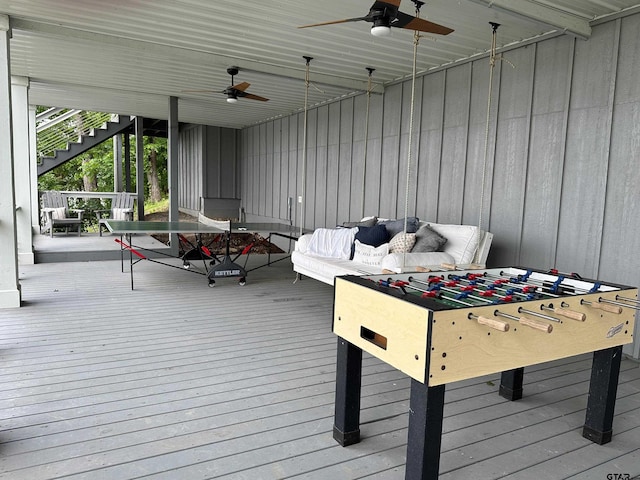 exterior space with hardwood / wood-style flooring and a ceiling fan