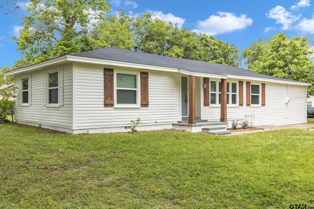 ranch-style home featuring crawl space and a front lawn