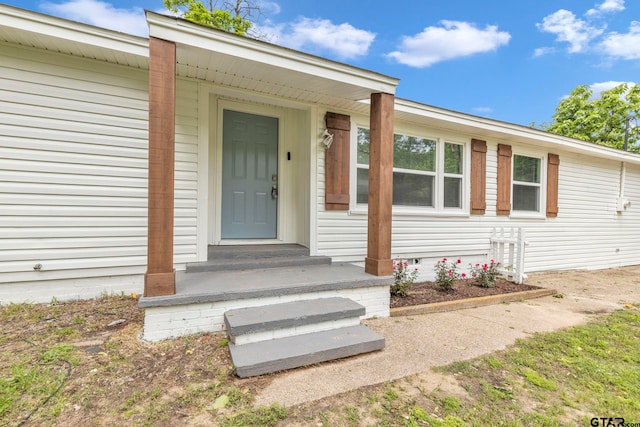 view of exterior entry featuring crawl space