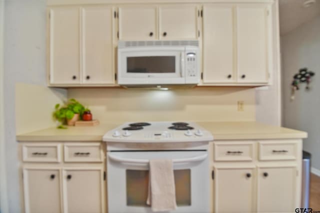 201 Karla Dr, Whitehouse, TX 75791 - kitchen featuring white appliances and light countertops