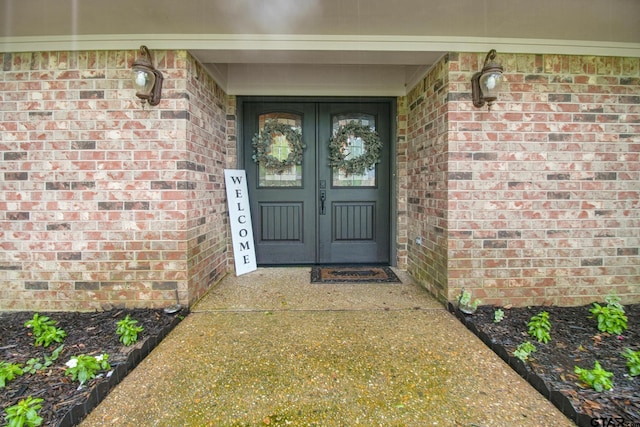 201 Karla Dr, Whitehouse, TX 75791 - view of exterior entry with french doors and brick siding