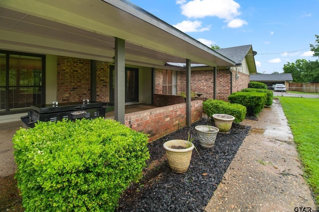 201 Karla Dr, Whitehouse, TX 75791 - view of side of home featuring brick siding