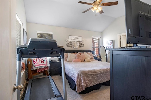 carpeted bedroom with lofted ceiling and ceiling fan