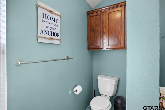 bathroom featuring toilet