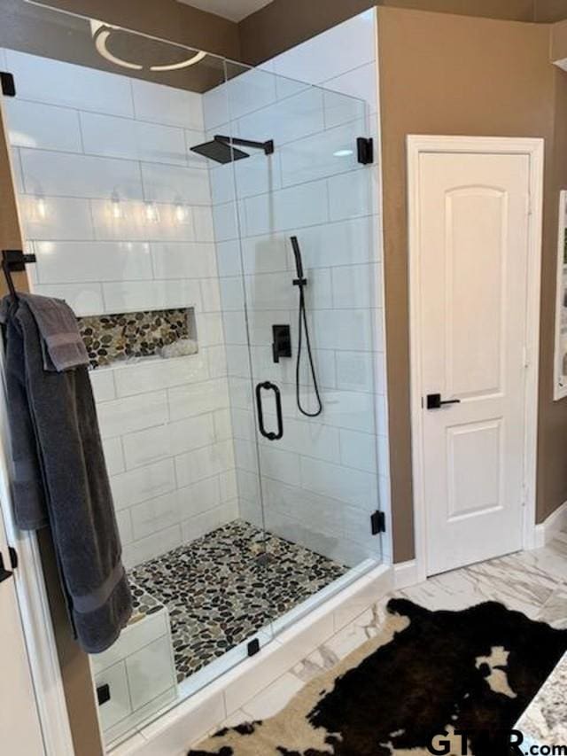 21105 Altuda Ln, Flint, TX 75762 - full bath with a stall shower and baseboards