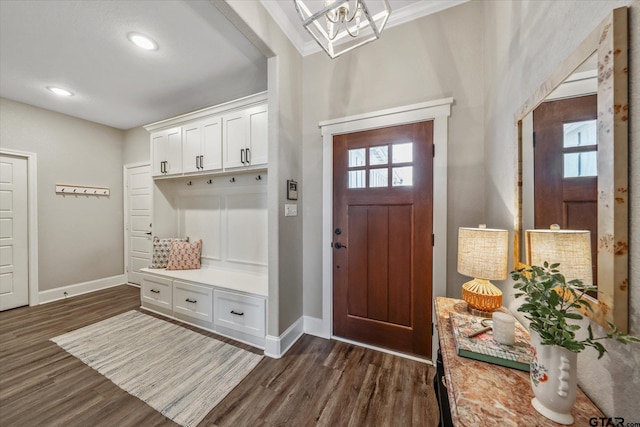 mudroom with dark wood-style floors, recessed lighting, an inviting chandelier, and baseboards