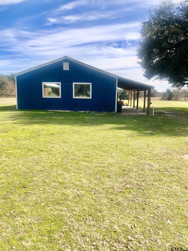 exterior space with a yard