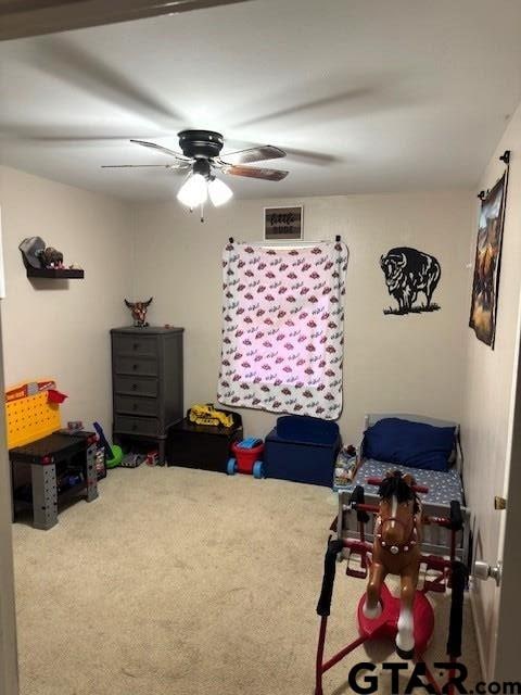 rec room with a ceiling fan