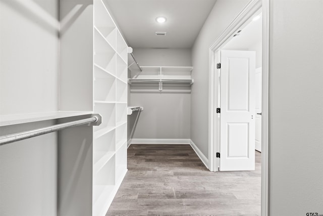 walk in closet featuring light wood-type flooring