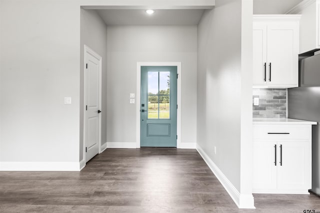 foyer featuring dark hardwood / wood-style floors