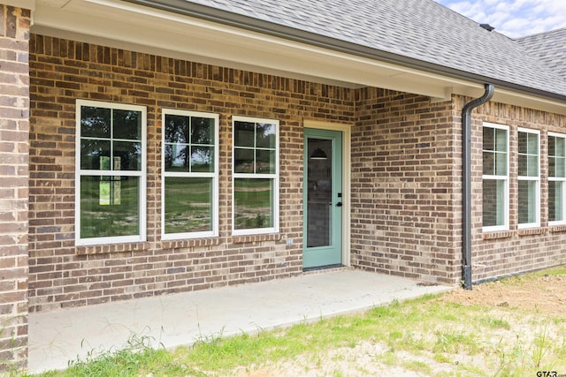 property entrance with a patio area