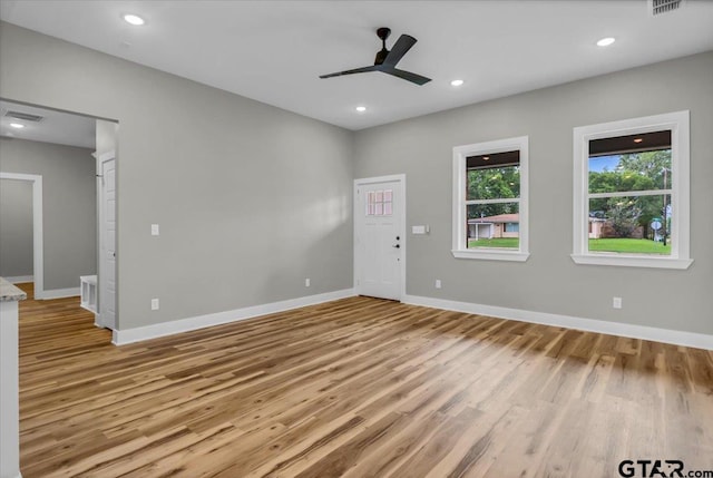 1002 E Main St, Whitehouse, TX 75791 - empty room with light wood-style flooring, ceiling fan, baseboards, and recessed lighting