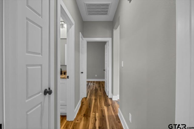 1002 E Main St, Whitehouse, TX 75791 - hallway featuring wood finished floors and baseboards