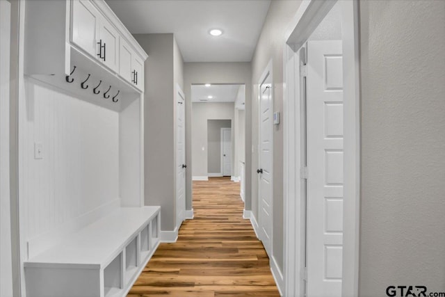 1002 E Main St, Whitehouse, TX 75791 - mudroom with light wood-style flooring, baseboards, and recessed lighting
