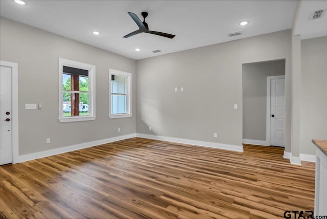 1002 E Main St, Whitehouse, TX 75791 - unfurnished living room with a ceiling fan, wood finished floors, baseboards, and recessed lighting