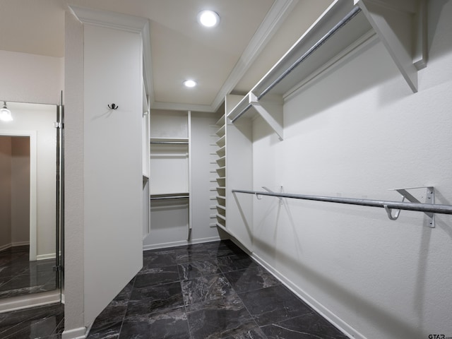 4010 Silverwood Dr, Tyler, TX 75701 - spacious closet with dark marble finish floors