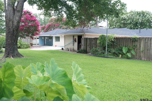 4010 Silverwood Dr, Tyler, TX 75701 - view of front facade with roof with shingles and board and batten siding