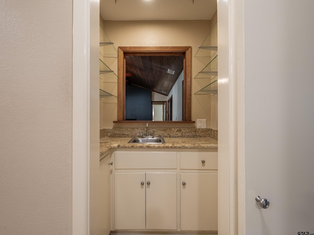 4010 Silverwood Dr, Tyler, TX 75701 - bathroom featuring vanity and lofted ceiling