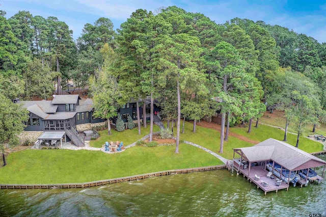 birds eye view of property featuring a water view