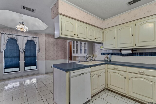 kitchen featuring dishwasher, kitchen peninsula, a textured ceiling, sink, and crown molding