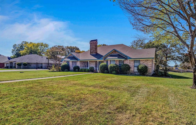 ranch-style house with a front yard