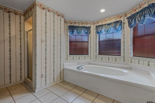 bathroom featuring independent shower and bath, tile patterned flooring, and crown molding